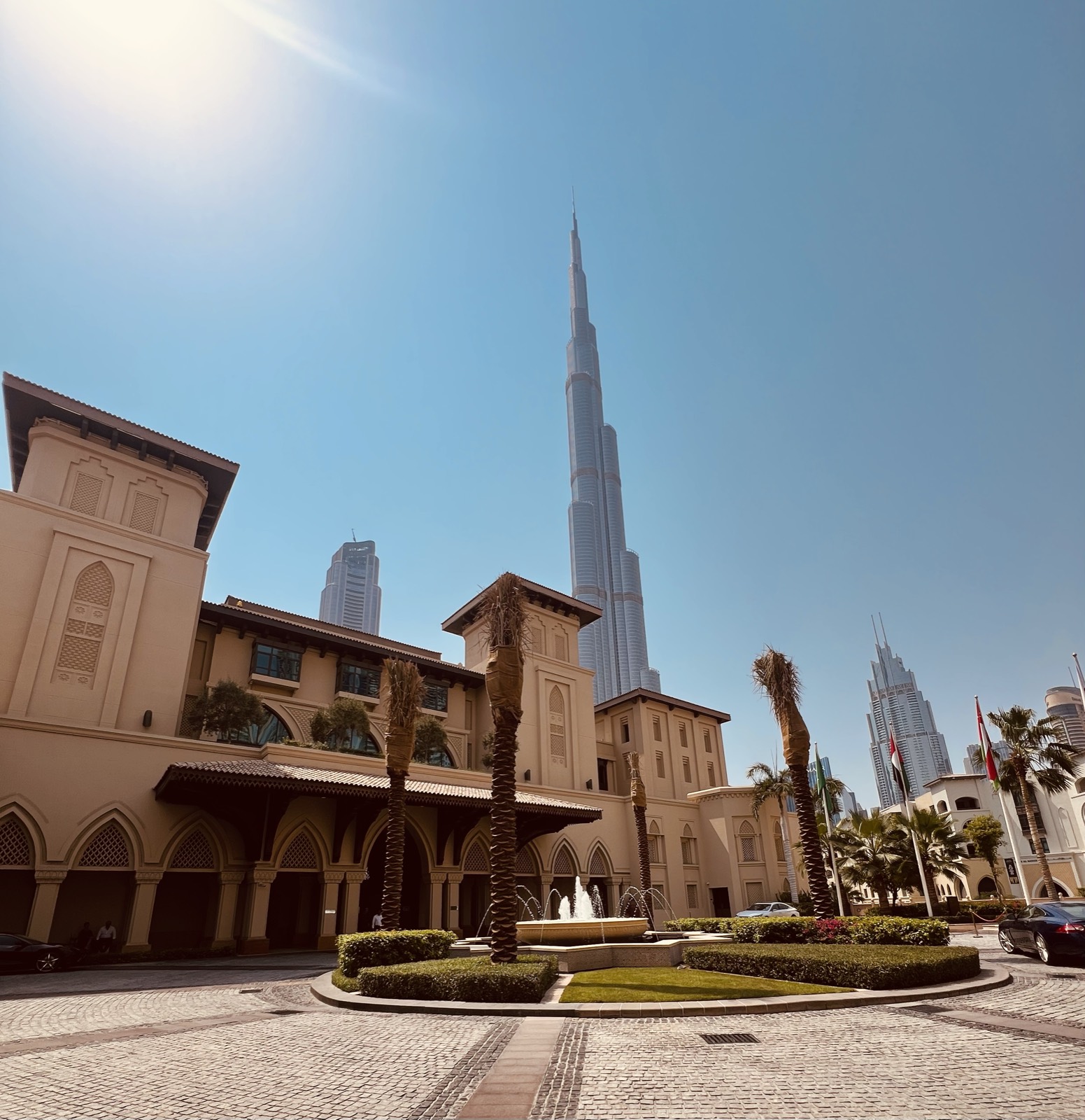 Palace courtyard fountain in Downtown Dubai with the Burj Khalifa behind